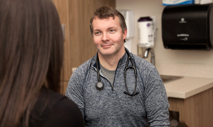 Ballad Health provider speaking with patient