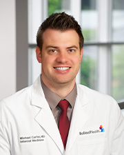 Head and shoulders portrait of Norton Internal Medicine Resident Michael Carter, MD