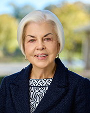 Head and shoulders portrait of Justine Hill, 2025 Servant’s Heart Award Winner