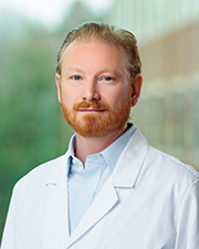 Head and shoulders portrait of Jeff Manfedonia, DO