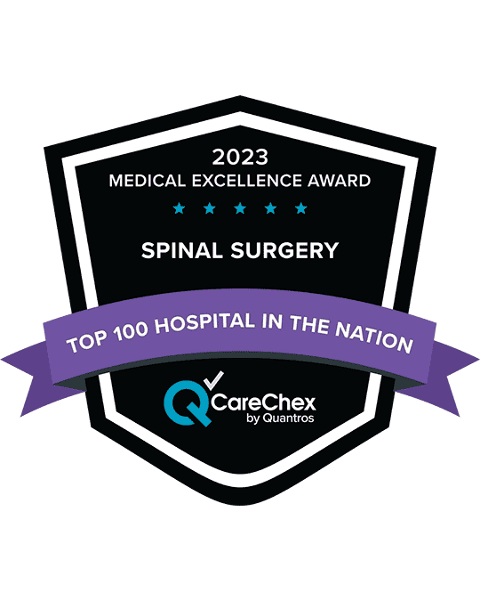 Awards badge for Top 10% Hospital in the Nation for Medical Excellence in Spinal Surgery - 2023 CareChex by Quantros