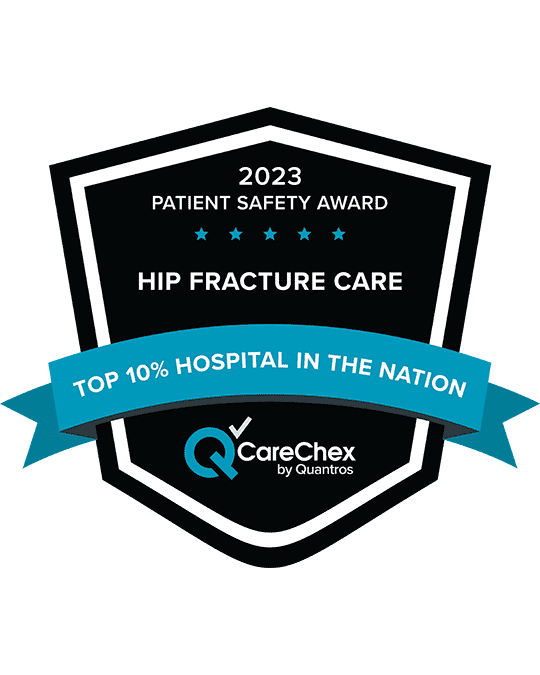 Awards badge for Top 10% Hospital in the Nation for Patient Safety in Hip Fracture Care - 2023 CareChex by Quantros