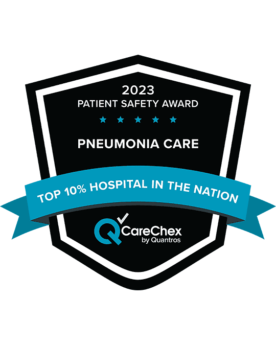 Awards badge for Top 10% Hospital in the Nation for Patient Safety in Pneumonia Care - 2023 CareChex by Quantros