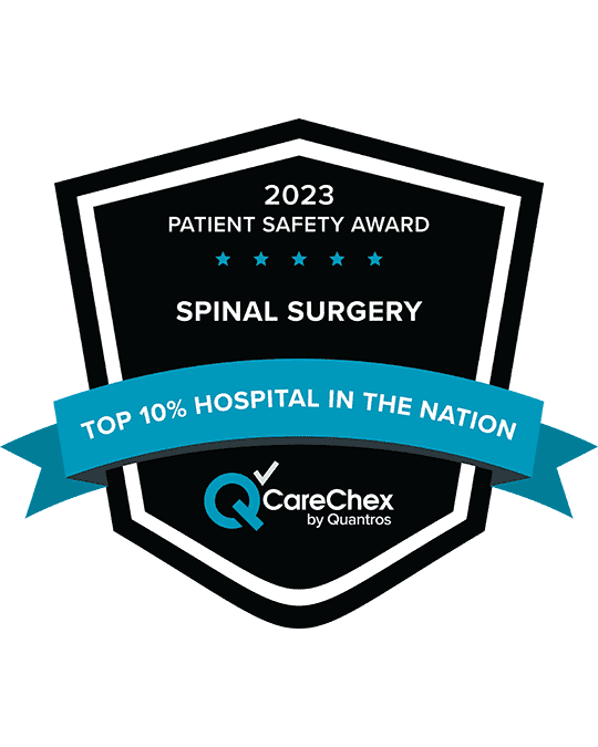 Awards badge for Top 10% Hospital in the Nation for Patient Safety in Spinal Surgery - 2023 CareChex by Quantros