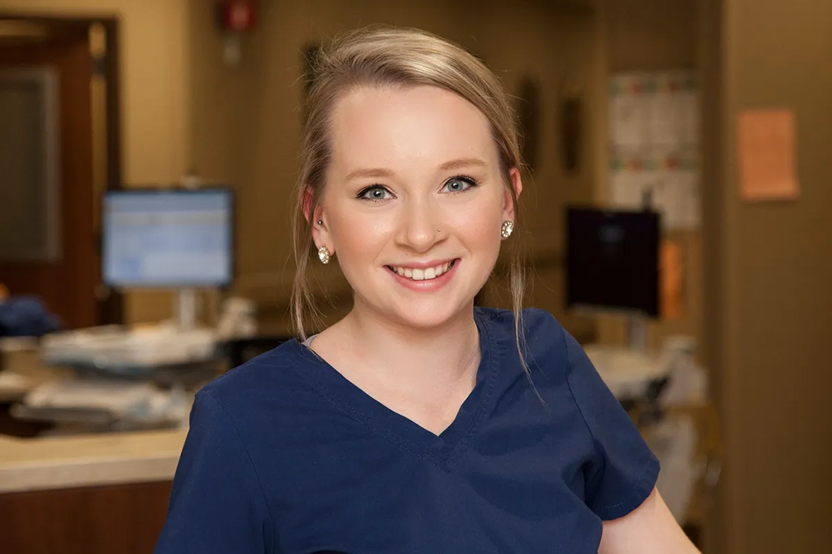 Photo of Ballad Health CNA in blue scrubs