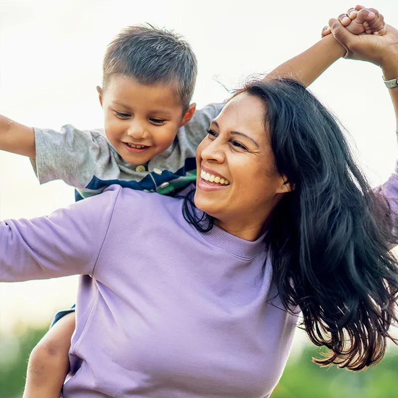 Photo of a mother playing with her child