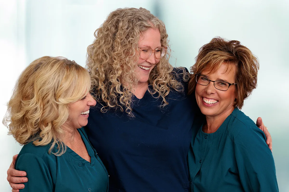 Photo of three Ballad Health nurses standing together and smiling