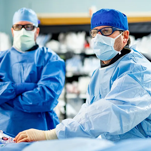David Chris Metzger, MD performing heart surgery